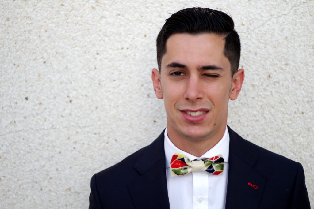 Model wearing original colourful ceramic bow tie Bowtery.