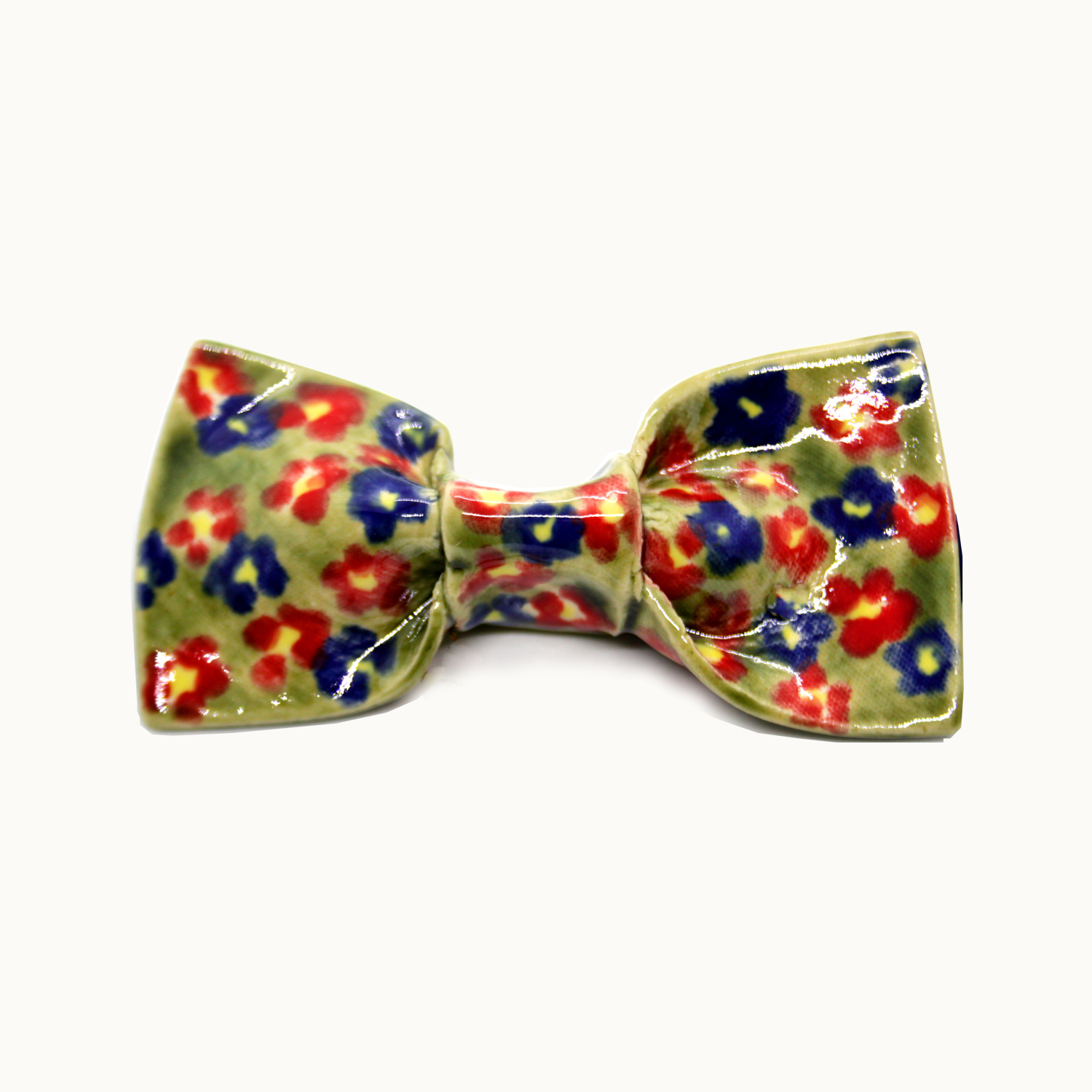 Pajarita hecha a mano en cerámica Bowtery Primavera original y exclusiva con flores azules rojas verdes y amarillas. Handmade ceramic colourful bow tie yellow blue red green flowers patterned
